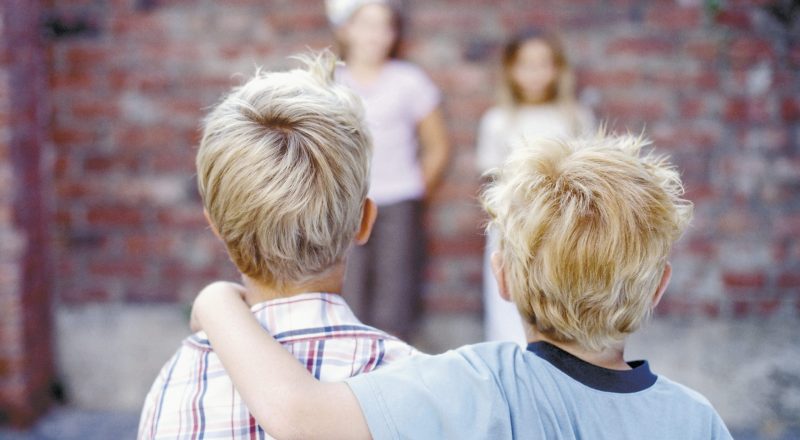 Boys and girls facing each other